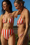 anja bikini high-waisted bikini bottom la magnétique striped orange close-up