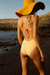 anja swimsuit one-piece le sophistiqué vichy yellow background shooting